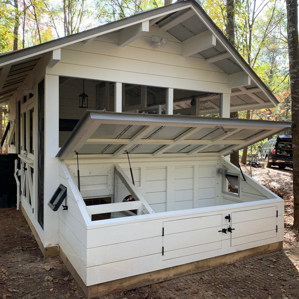 Modern-farmhouse-chicken-and-duck-coop-has-a-duck-dipper-for-ducks-to-get-their-heads-wet.jpg